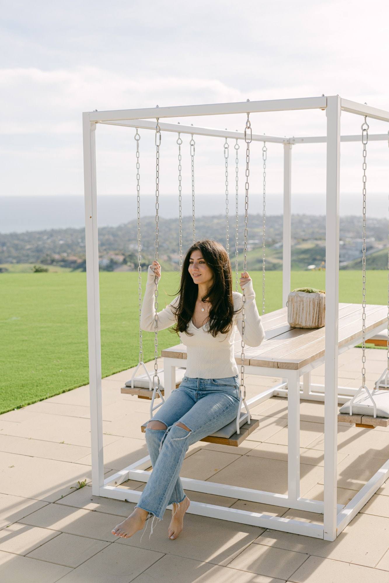 Shauna Shakiban on a terrace above the Malibu coastline